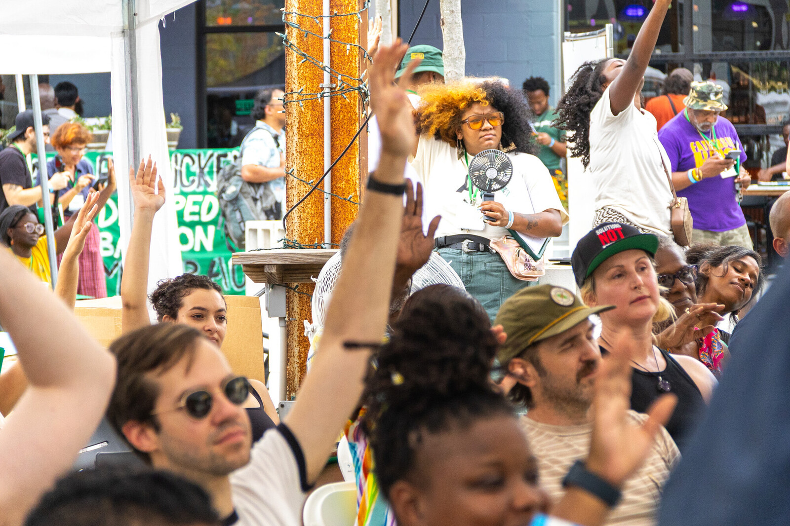 People gathered at a People's Movement Assembly